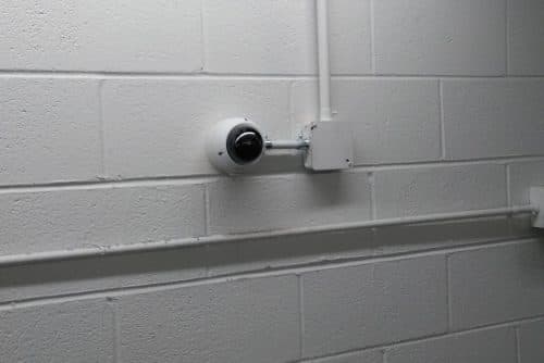 Alarm sensor installation on a door frame