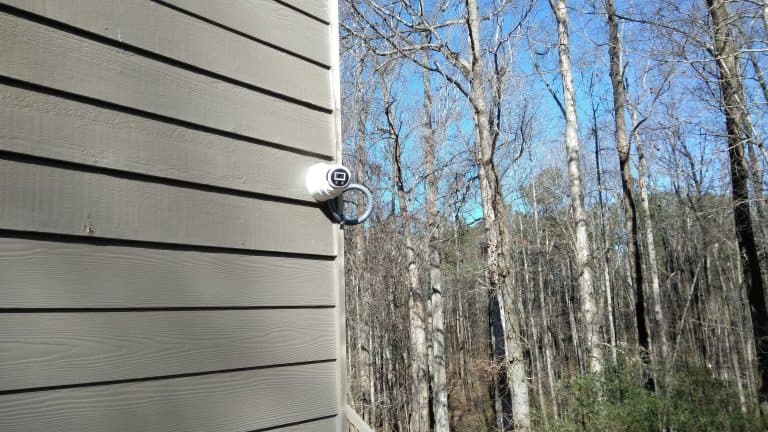 Wide-angle security camera view of a property