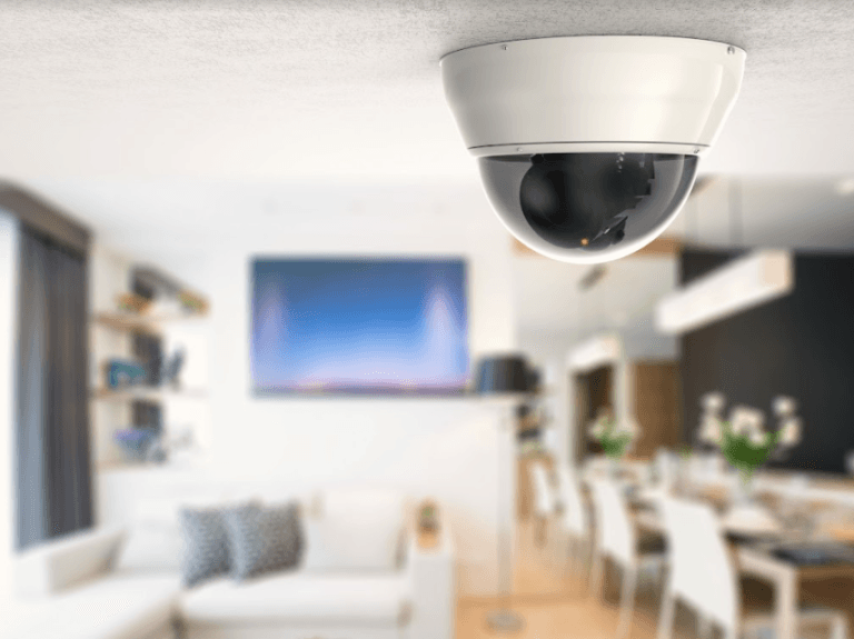 Indoor home security camera on a shelf